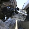 A motorist fills his car's tank with unleaded fuel at a service station in Washington  in a file photo.  REUTERS/Jason Reed