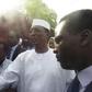 Chadian President Idriss Deby (2nd R) arrives at a polling station during the presidential election in Ndjamena, Chad, April 10, 2016.