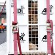 A former circus lion looks from inside his cage while preparing for transportation to a private sanctuary in South Africa, during an airlift organized by Animal Defenders International in Callao, Peru, April 29, 2016.