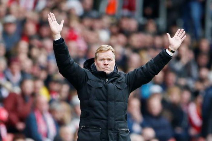 Remove headphone and talk to team mates, Koeman tells players