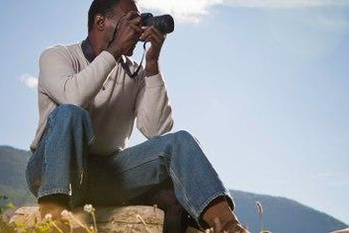 ___4862456___https:______static.pulse.com.gh___webservice___escenic___binary___4862456___2016___3___30___16___black-man-camera-field