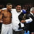 Anthony Joshua celebrates his win with his father Jonathan