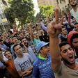 FIle picture of Egyptian protesters and Muslim Brotherhood members shouting slogans against President Abdel Fattah al-Sisi and the government during a demonstration protesting the government's decision to transfer two Red Sea islands to Saudi Arabia, i...