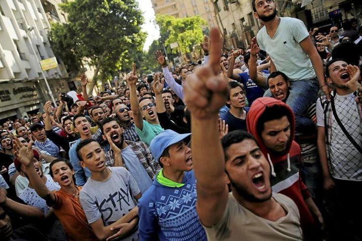 FIle picture of Egyptian protesters and Muslim Brotherhood members shouting slogans against President Abdel Fattah al-Sisi and the government during a demonstration protesting the government's decision to transfer two Red Sea islands to Saudi Arabia, i...