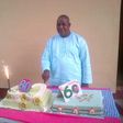 Adebayo Salami aka Oga Bello cutting his 60thbirthday cake in 2013
