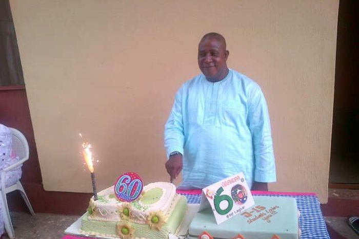 Adebayo Salami aka Oga Bello cutting his 60thbirthday cake in 2013