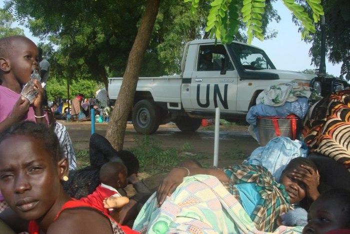 This image provided by UNMISS on July 11, 2016 shows displaced women, men and children taking shelter at the UN compound in Tomping area in Juba 
