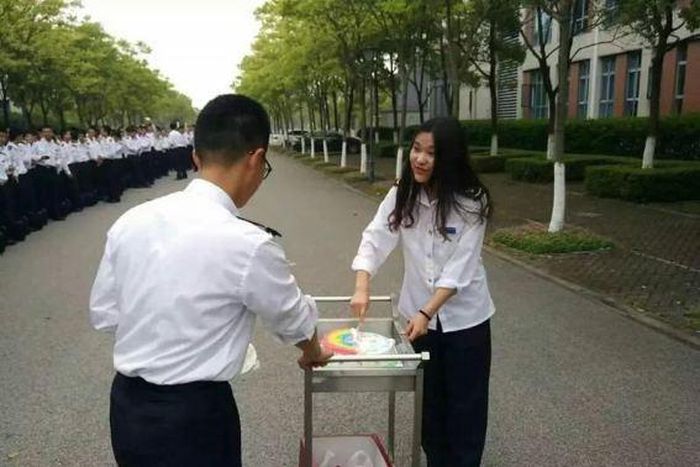 Over 100 male students comes out to celebrate their only female classmates birthday