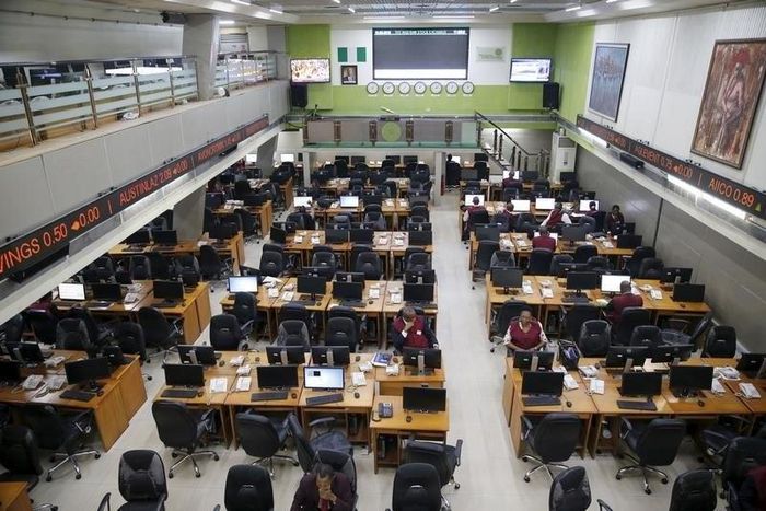 Traders take a break at the trading floor of the Nigerian Stock Exchange in Lagos, Nigeria February 10, 2016. REUTERS/Akintunde Akinleye
