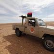 A Libyan soldier sits in a military vehicle at military outpost in Wadi Bey, west of the Islamic State-held city of Sirte, February 23, 2016. REUTERS/Ismail Zitouny