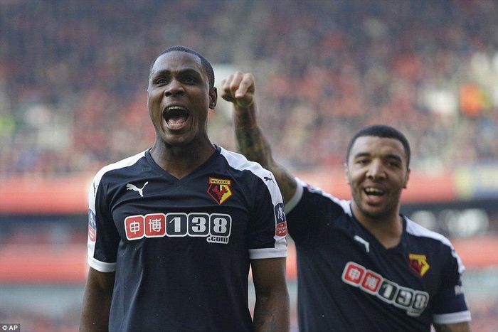 Odion Ighalo and Troy Deeney celebrating a Watford goal against Arsenal on Sunday, March 13