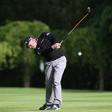 England's Lee Westwood plays his second shot at the 10th hole during the second round