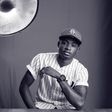 Sepia image of Lil Kesh captured by Paul Ukonu Photography