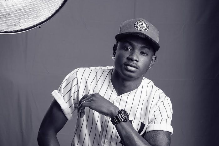 Sepia image of Lil Kesh captured by Paul Ukonu Photography