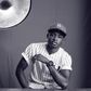 Sepia image of Lil Kesh captured by Paul Ukonu Photography