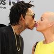 Wiz Khalifa and Amber Rose share a kiss