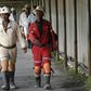Miners walk at the end of their shift at the Anglo Platinum's Khuseleka shaft 1 mine in Rustenburg, northwest of Johannesburg, January 15, 2013.
