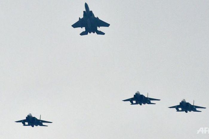 Four bodies found after Japan jet crash, military officials say