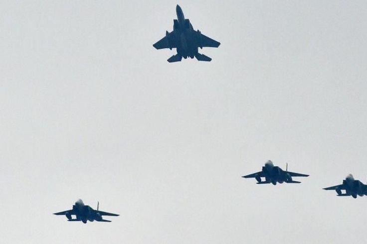 Four bodies found after Japan jet crash, military officials say