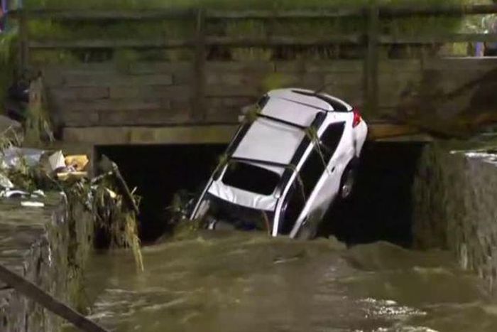 Two dead as flood tears through Maryland downtown