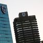 The logo of South Africa's Standard Bank is seen above the company's headquarters in Cape Town, South Africa May 6, 2016. REUTERS/Mike Hutchings/File Photo