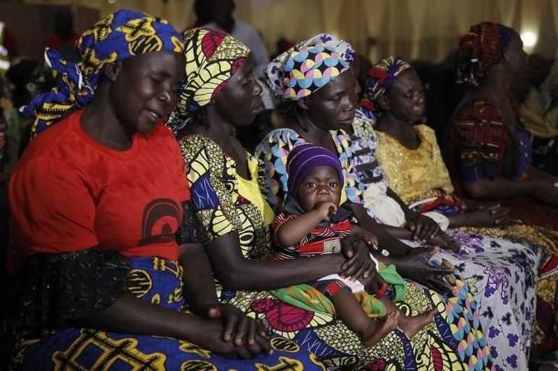 Parents of the Chibok girls attend a meeting with Nigeria's President Muhammadu Buhari at the presidential villa in Abuja, Nigeria, January 14, 2016.