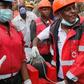 Kenya Red Cross rescuers evacuate a woman from the rubble of a six-storey building that collapsed last Friday after days of heavy rain, in Nairobi, Kenya May 5, 2016.
