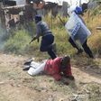 Zimbabwe police fire teargas as taxi drivers' protest turns violent
