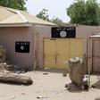 A wall painted by Boko Haram is seen in Damasak March 24, 2015. B