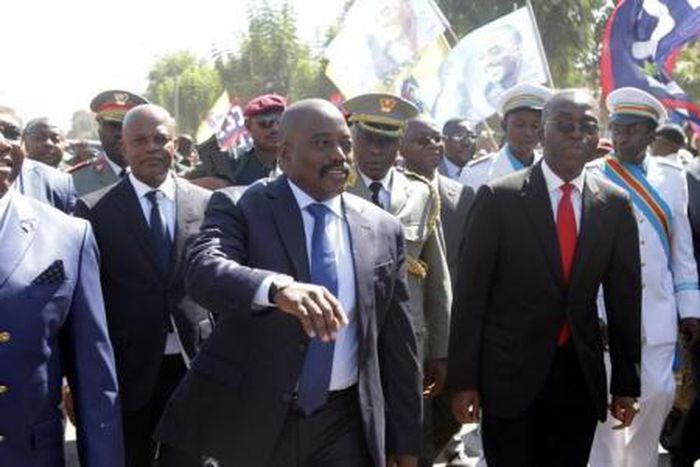 Democratic Republic of the Congo"s President Joseph Kabila (C) greets supporters as he arrives at the airport in Lubumbashi, the capital of Katanga province in the Democratic Republic of Congo, June 13, 2016.