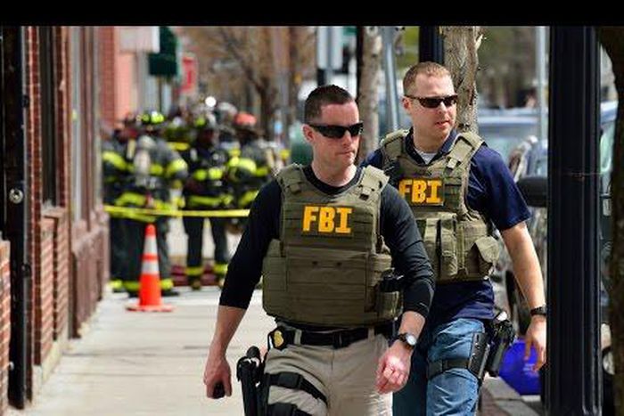 U.S. counter-spy chief cuffs driver who rammed restaurant