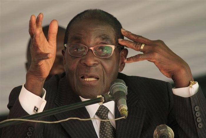 Zimbabwe President Robert Mugabe addresses a memorial service for retired general Solomon Mujuru at Ruzambo Farm in the Beatrice area, about 65 km (40 miles) south of the capital Harare, May 5, 2012. REUTERS/Philimon Bulawayo