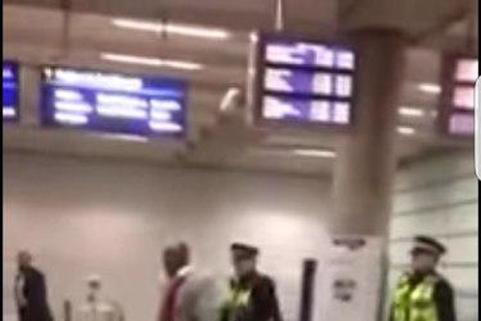 Nigerian man being assaulted by UK police