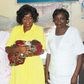 Dr. Inyang Asibong with one of the rescued babies