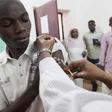 Staff members of Teaching Hospital receive the first vaccination treatment for yellow fever in El Geneina, West Darfur in this November 14, 2012 handout.