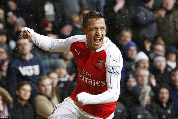 Alexis Sanchez celebrates after scoring Arsenal's equaliser against Tottenham on Saturday, March 5