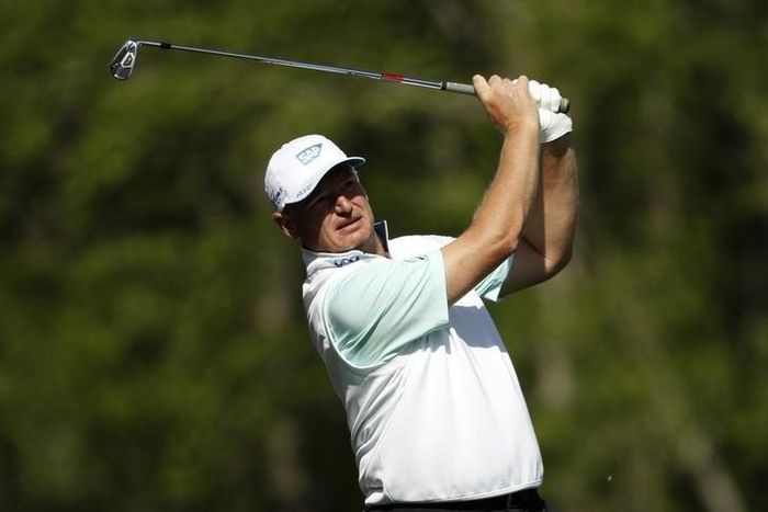 The Masters golf tournament at Augusta National Golf Club. Apr 7, 2016; Augusta, GA, USA; Ernie Els hits his tee shot on the 12th hole during the first round of the 2016