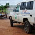 A health worker sprays disinfectant on an ambulance in Nedowein, Liberia, July 15, 2015.