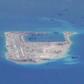 Chinese military aircraft makes first public landing on disputed island