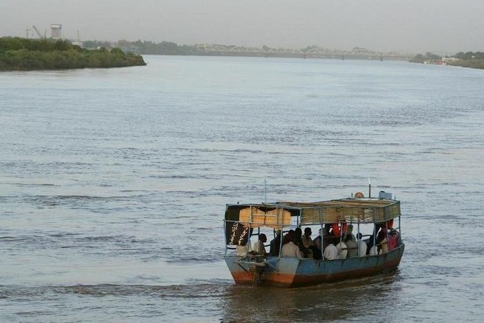Sudanese villagers travel by boat on the river Nile in Sudan's capital Khartoum, September in a file photo. REUTERS/Antony Njuguna
