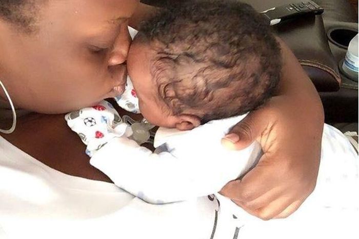 Bimbo Thomas and baby