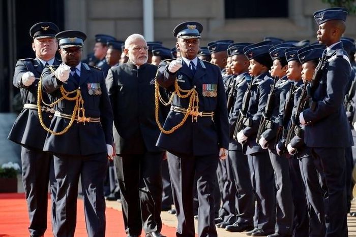 India's Prime Minister Narendra Modi (3rd L) inspects a guard of honour during his state visit at the Union Buildings in Pretoria, South Africa July 8, 2016.