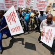 Kenyan taxi drivers signed up to ride-hailing service Uber chant slogans and dance along the streets during a strike after the company slashed prices in the face of growing competition from similar local firms in Kenya's capital Nairobi, August 2, 2016...