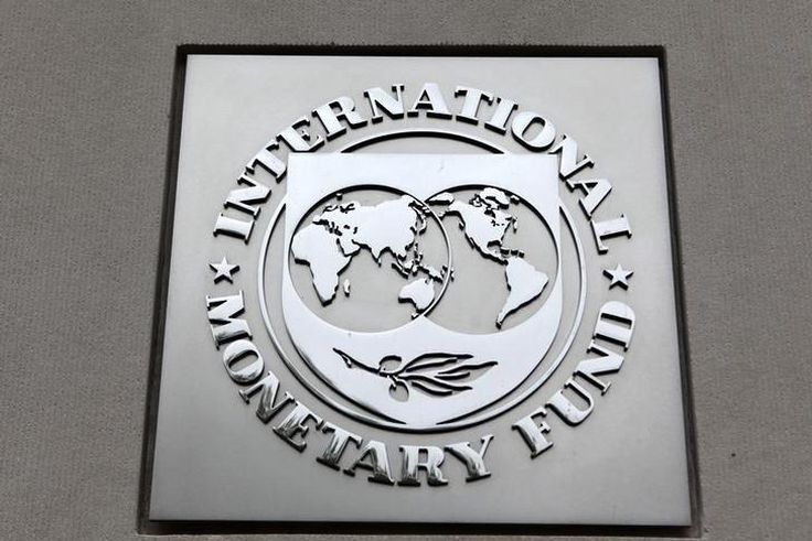 The International Monetary Fund (IMF) logo is seen at the IMF headquarters building during the 2013 Spring Meeting of the International Monetary Fund and World Bank in Washington, April 18, 2013. REUTERS/Yuri Gripas