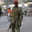 A soldier holds his weapon as he watches a procession by Uganda's leading opposition party Forum for Democratic Change supporters being dispersed in Kampala, Uganda, February 15, 2016.