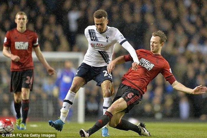 Dele Alli and Jonny Evans