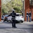 An Italian policeman directs cars in front of a barracks, where Egyptian investigators are meeting Italian magistrates about the murder in Cairo of Italian student Giulio Regeni, in Rome, Italy, April 7, 2016. REUTERS/Alessandro Bianchi