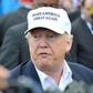 An activist campaign seeks to shame U.S. companies over Trump