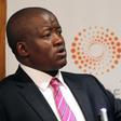 South African Treasury Director-General Lungisa Fuzile gestures as he addresses the Reuters Economist of the Year Award ceremony in Johannesburg April 13, 2012. REUTERS/Mike Hutchings