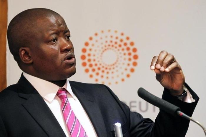South African Treasury Director-General Lungisa Fuzile gestures as he addresses the Reuters Economist of the Year Award ceremony in Johannesburg April 13, 2012. REUTERS/Mike Hutchings